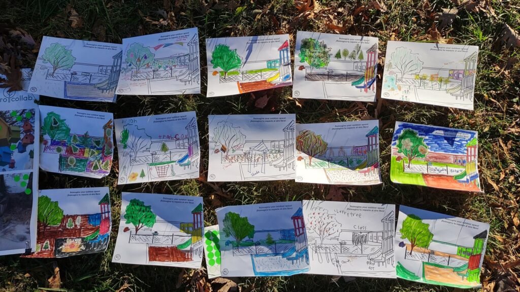 Nine student design drawings for Wildcat Way laid out on the ground