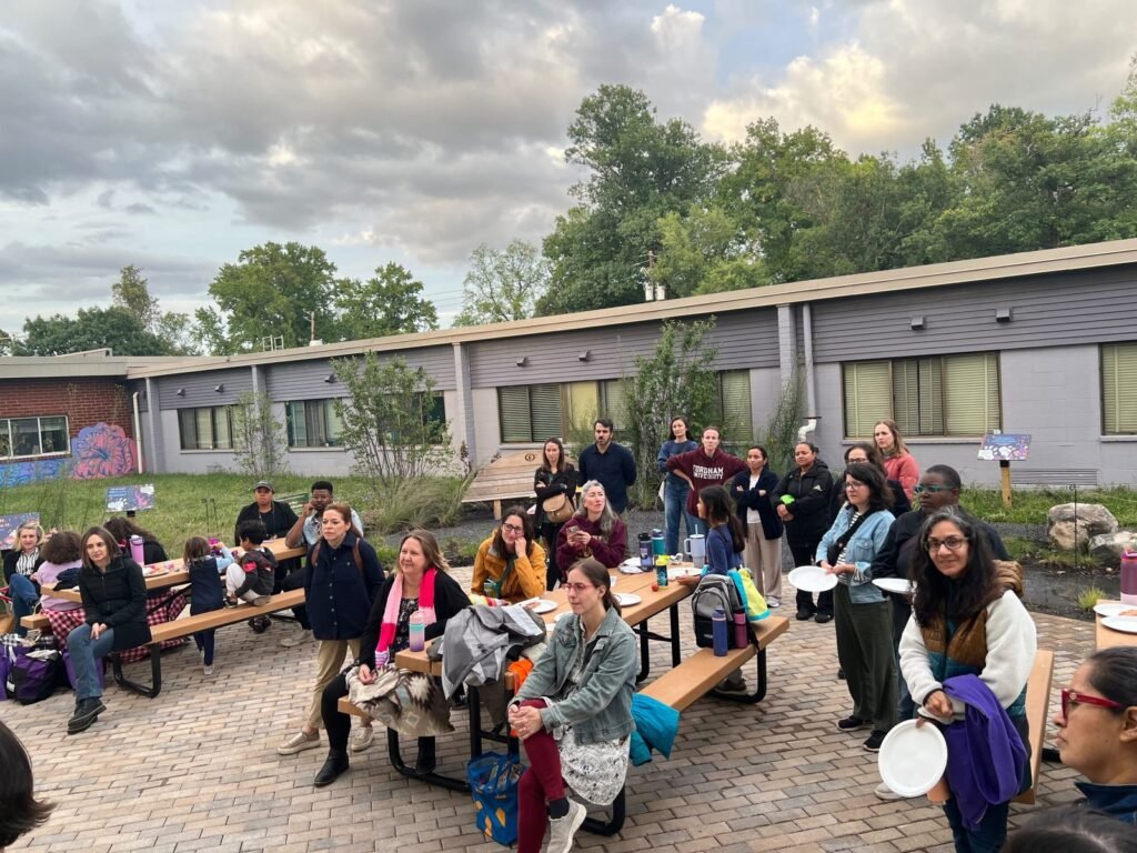 Parents and caregivers listening at the September 2026 PTO meeting