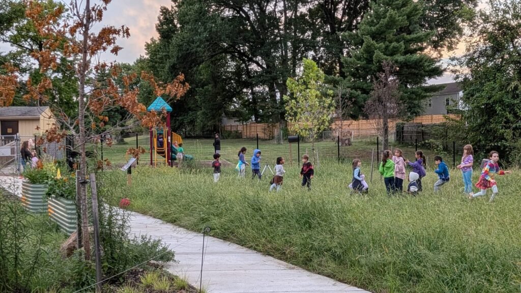 Kids playing on the field during the September 2026 PTO meeting